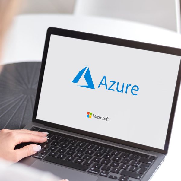 Laptop displaying Microsoft Azure logo, showcasing cloud computing services with a clear view of the keyboard and logo design.
