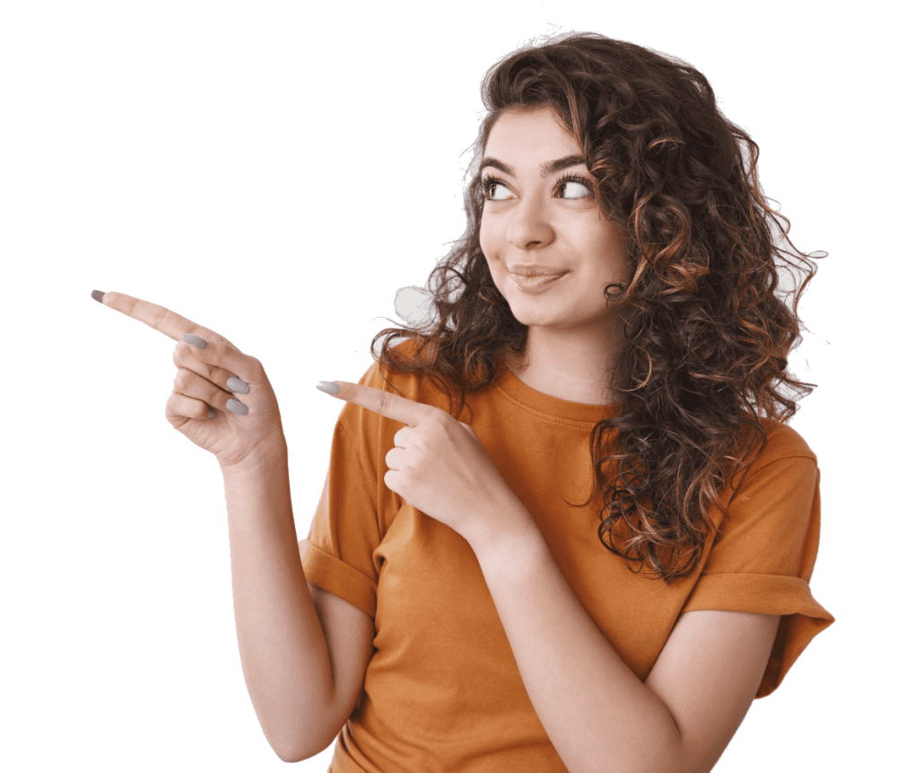 A young woman with curly hair wearing an orange shirt, pointing in two directions with a playful expression, suitable for various contexts.